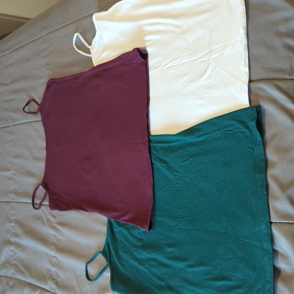 Three brand new tank tops.